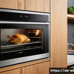 Home 22 주방 IoT 기술 활용법 - A modern German kitchen interior featuring a sleek smart oven with a digital touchscreen panel displ...