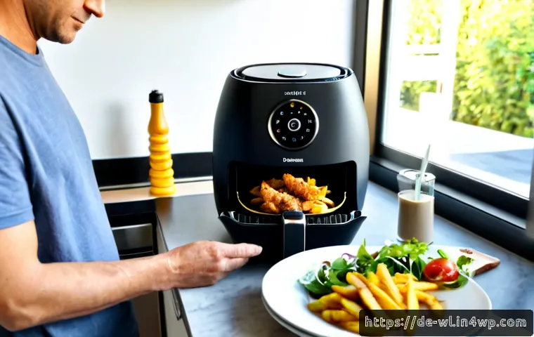 스마트 주방에서의 패스트푸드 대안 - Photorealistic modern German smart kitchen, a compact countertop air fryer and smart oven preparing ...